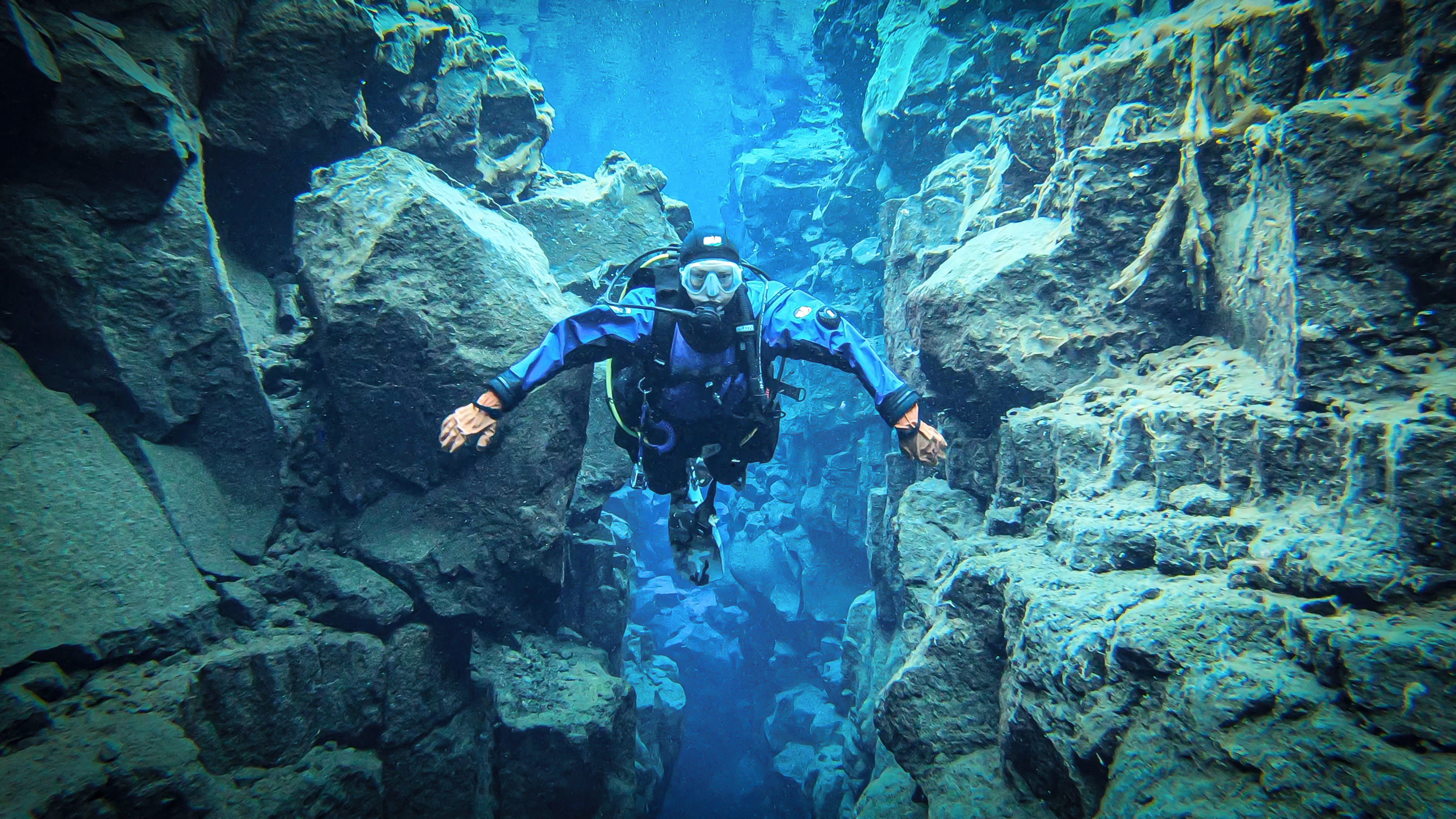 Shot of diver at Silfra, Iceland before Auto Color is applied