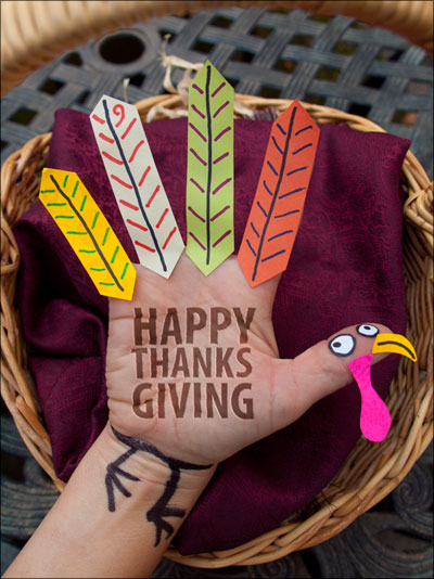 A live hand turkey